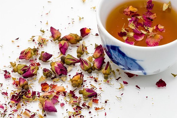 Make rose tea with dried buds and petals