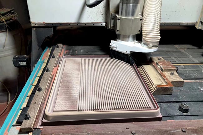 The primary processing of bakelite tea tray is done by machine