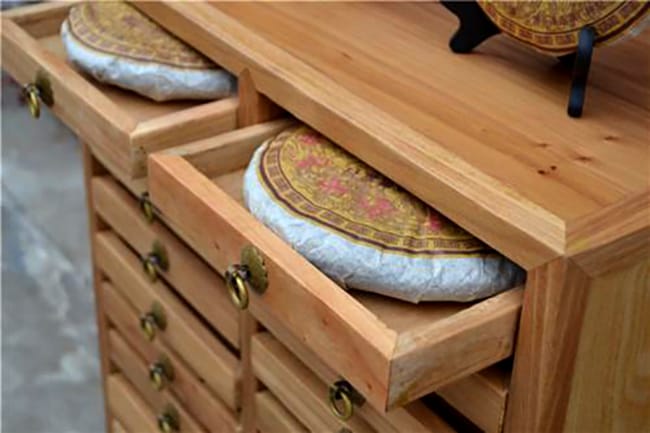 aging pu-erh tea in a dark drawer